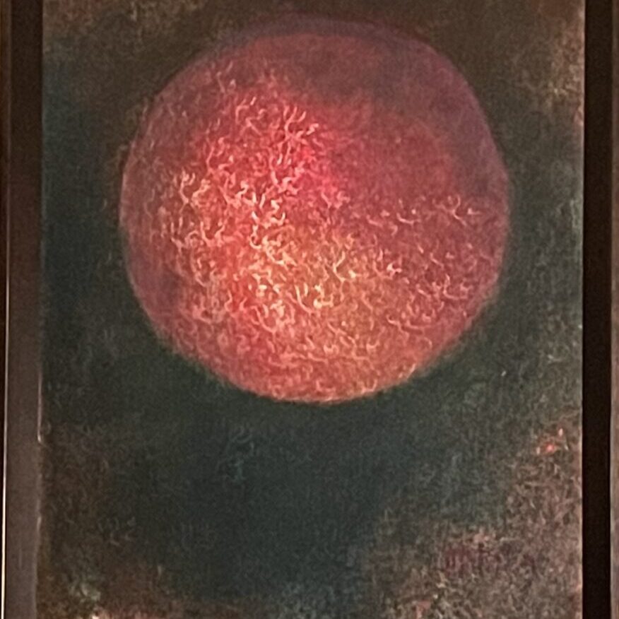 A painting of an orange in the middle of a dark room.